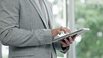 Hands, typing and a person with a tablet at work for communication, email or connection. Business, working and a corporate employee with technology for a notification, chat or contact for networking