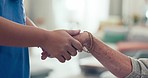 Support, holding hands and senior patient with caregiver and nurse in retirement home with empathy. Elderly person, healthcare professional and doctor with kindness, helping and hope in a clinic 