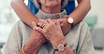 Nurse, holding hands and senior patient hug with caregiver and support in retirement home with empathy. Elderly person, healthcare professional and doctor with kindness, helping and hope in a clinic 