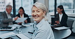 Meeting, collaboration and a senior business woman in the boardroom with her team for planning or training. Portrait, teamwork and smile of a female manager in an office for a strategy workshop