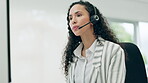 Headset, talking and a woman in a call center for customer service, telemarketing and crm. Female consultant or agent at a computer with account information for technical support, sales or help desk