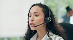 Headset, talking and a woman in a call center for customer service, telemarketing and crm. Face of a female consultant or agent at a computer for technical support, sales or help desk advice