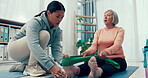 Physiotherapist, band or old woman stretching legs to help in physical therapy for mobility rehabilitation exercise. Elderly patient, resistance bands or physiotherapy workout for muscle flexibility