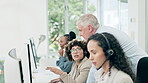 Call center, training and senior man with employees at desk, computer or office of customer serivce, crm and telemarketing. Coaching, mentor and manager with woman learning about technical support