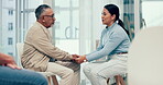 Support, psychologist or old man holding hands for comfort, empathy or compassion while sitting together. Trust, sympathy or therapist listening, talking or healing a loss with person in counseling