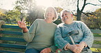 Happy, talking and senior women in nature for conversation, relax and retirement bonding. Smile, laughing and elderly friends on a bench in a park for communication and view together in summer