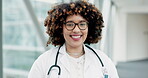 Face, happy doctor and woman in hospital for healthcare, wellness and insurance. Medical professional, portrait and surgeon smile, expert with glasses and employee from South Africa in health clinic