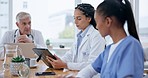 Collaboration, technology and team of doctors in a discussion in hospital boardroom for a treatment plan. Diversity, meeting and group of healthcare workers planning and brainstorming for diagnosis.