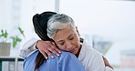 Hug, women and doctors with empathy, healthcare and comfort in a hospital, support and care. Female people, medical professionals and ladies embrace, clinic and sad with bad news, depression or trust