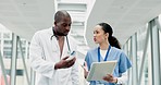 Advice, healthcare and doctors with paperwork, discussion and check information with diagnosis, checklist or planning. Medical professionals, black man or woman in a hospital with insurance documents