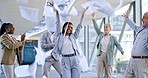 Documents in air, celebration and business people dance in office for achievement, winner and goals. Teamwork, collaboration and excited men and women dancing, throw paperwork and winning for success