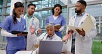 Team of doctors, argument and fight with laptop in hospital for healthcare in clinic. Computer, medical nurses and group in conflict, problem and disagreement, communication and talking at meeting