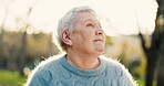 Senior woman, thinking and relax outdoor in a park with freedom, fresh air and peace. Face of elderly lady or old person in nature, forest or woods for health and wellness in retirement