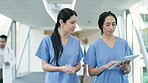 Teamwork, tablet or nurses speaking of results in collaboration together in a hospital clinic. Women, healthcare or doctors reading online cardiology news report, medical feedback or research data