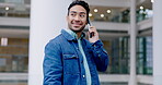 Phone call, talking and a man in a building for communication, chat and conversation with connection. Happy asian male person with a smartphone for negotiation, contact and creative work proposal