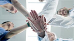 Hands, teamwork or doctors in huddle with support in collaboration for healthcare goals together. Hospital closeup, people or low angle of medical nurses with group solidarity, motivation or mission