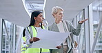 Woman, architect and blueprint with documents for construction, strategy or planning together in city. Women, contractor or engineer in teamwork with floor plan for industrial architecture in town