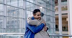 Business, collaboration and a man hugging a woman in the office, greeting a colleague with a friendly smile. Welcome, meeting a senior female mentor embracing a professional employee in the workplace