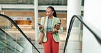 Business woman, phone and travel on escalator for startup pitch, conference and seminar in convention center. Smile, African employee and creative on mobile technology and moving stairs for work trip