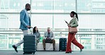 Business people, luggage and airport lobby with walking, smartphone communication and international travel. Men, women and busy foyer for plane, global flight schedule and immigration in Cape Town