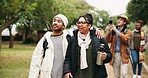 Camping group, view and couple friends walking with adventure, journey and hike outdoor. Conversation, young people and travel for holiday and vacation together in nature with discussion on break