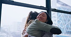 Hug, love and women employees greeting in an office as work friends for support, trust or happy together. Corporate, colleagues and business people or staff with care or happiness for workplace visit