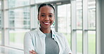 Face, smile and arms crossed with a business black woman in the office for management or leadership. Portrait, mindset and a happy young employee in the workplace for career growth or development