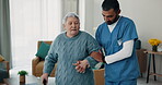 Senior woman, nurse and walking stick for support at a nursing home in retirement. Elderly female patient with a disability and caregiver man for rehabilitation, healthcare or homecare and help