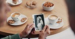 Senior tea, hands and photos for a memory with people talking at a table in a house. Coffee, lunch and friends looking at pictures together for discussion, conversation or nostalgia in a home