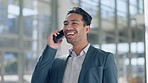 Happy business man, phone call and corridor with talking, networking and communication for deal in workplace. Asian entrepreneur, smartphone and conversation with contact, smile and chat in Jakarta