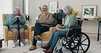 Conversation, laughing and elderly friends in the living room of their nursing or retirement home. Bonding, discussion and group of senior people with disability talking in lounge together at house.
