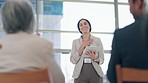 Presentation, tradeshow and woman on tablet with applause from audience for conference success. Corporate, office and female speaker with business people clapping in workshop, convention or seminar