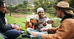 Dancing, guitar and friends camping in nature with laughing, freedom and happy celebration at lake. Music, outdoor adventure and singing, men and women on river grass on summer weekend camp together.