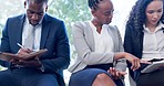 Business people, queue and waiting room for interview with tablet, notebook and conversation for recruitment drive. Men, woman and helping hand for hiring, human resources or strategy for opportunity