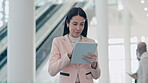 Tablet, consultant and business woman research in office lobby for social media, online app or networking. Technology, serious professional walking and scroll on internet, website and typing email