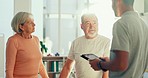 Physiotherapy, tablet and man with senior couple for consulting, medical care and wellness. Chiropractor talking to man and woman on digital tech for physical therapy, rehabilitation and healthcare