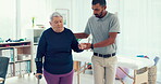 Man, physiotherapy and patient in elderly care with crutches for walking, consultation or assessment at clinic. Male medical physiotherapist or caregiver helping senior person with a disability