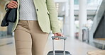 Airport travel, walking and a person with luggage for a business trip, holiday or journey. Tourist, lobby and a woman with a suitcase for a vacation, plane or flight with baggage for departure