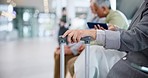 Airport, phone and people hands in waiting room for travel vacation, holiday or immigration with suitcase. Group of and men in lobby on mobile for social media, online flight schedule and luggage