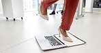 Business, fail and woman feet jump on laptop in office angry, stress and frustrated by glitch, 404 or scam disaster. Shoes, crisis and female with bad mood, Internet or fail, mistake or audit anxiety