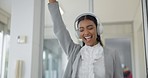 Music, dance and a business woman walking in the office while feeling happy, cheerful or carefree. Headphones, smile and a young female employee moving to sound while streaming audio at work