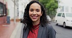 Face, smile and a business woman in the city for travel or commute to work in the morning. Portrait, street and mindset with a happy young female professional employee outdoor in an urban town