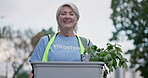 City volunteer, donation or senior happy woman with food box, vegetables container or grocery package for charity support. Kindness, retirement or elderly portrait person volunteering for NGO service