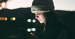 Woman, phone and typing at night in city for communication, social media or outdoor networking. Female person chatting, texting or online browsing in the late evening on mobile smartphone app outside