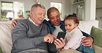 Grandfather, dad and girl with a smartphone, home and social media with connection, internet search and happiness. Old man, male parent and kid on a couch, cellphone and streaming cartoons with app