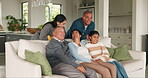 Big family, relax and happy together in lounge for bonding in living room, home or watching a tv show or movie on the weekend. Kid, parents and grandparents on sofa for quality time on holiday