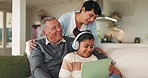 Tablet, grandparents and kid with headphones in home for music, bonding and happy family together on sofa. Girl, grandmother and grandfather with tech for internet, social media or app for learning