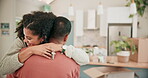 Face, smile and a homeowner couple hugging in their apartment while moving house for relocation together. Real estate, love and a woman embracing her husband, proud of their property investment