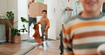 Real estate, moving and children running in new home happy and excited for future property together. Boxes, luggage and homeowner with kids after a purchase, sale or rent of a house as an investment