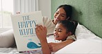 Bedroom, girl and mother reading book, smile and home with happiness, fantasy and relax with child development. Family, female kid and mama with daughter, storytelling and quality time with growth